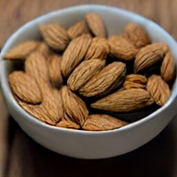 the almonds are transferred to a bowl.