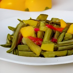 the food is transferred from the cooking surface to a plate.