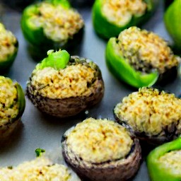 the stuffed portabello mushroom placed in a baking tray.