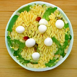 a large bowl of orzo pasta, dressing, small mozzarella balls, arugula, tomatoes, and toasted pine nuts.