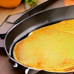a pancake is cooked for two minutes, and then the process is repeated with the remaining batter.