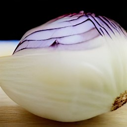 a red onion is peeled with a peeler.