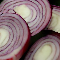 a red onion that has been cut into thin slices.