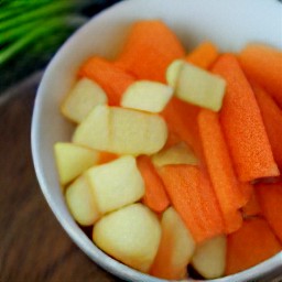 a bowl of coated veggies.