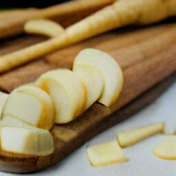 sliced parsnips, peeled and crushed garlic.