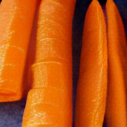 the carrots are cut lengthwise into thin strips.