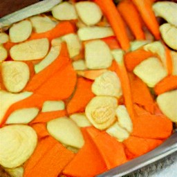 the veggies are transferred to a baking sheet and put in the oven for 30 minutes.