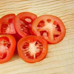 the tomatoes are cut into slices.