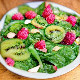 a serving plate with raspberries on top.
