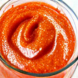 a puree of red chili pepper halves, rice vinegar, granulated sugar, and salt.