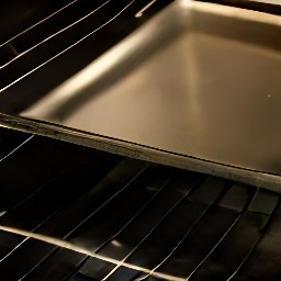a baking sheet is placed in the oven.