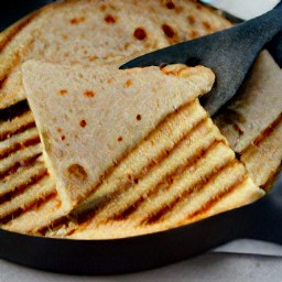 four crispy cheese chapati sandwiches.