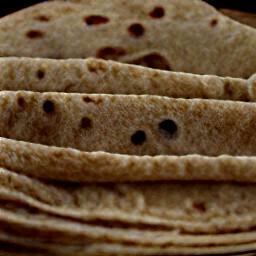 the chapatis cut in half.