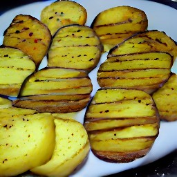 the potatoes are transferred to a serving plate.