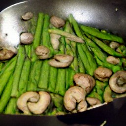 a dish of sautéed portabella mushrooms, asparagus, and shallots seasoned with salt and black pepper.