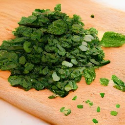 chopped spearmint and basil, then peeled garlic.