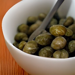 a dressing made from combining capers, balsamic vinegar, olive oil, 1 tsp of salt, and a quarter tsp of black pepper.