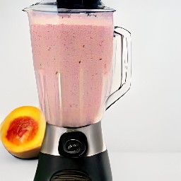 a smoothie made with frozen fruits, cranberry juice, and granulated sugar.