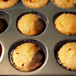 a muffin tin that has been baked in the oven for 25 minutes.