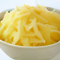 the potatoes are grated into small pieces.