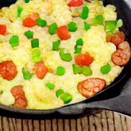 a dish of eggs with tomatoes, salt, pepper, rice vinegar, and granulated sugar.