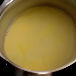 a baking dish greased with 1 tsp of butter.