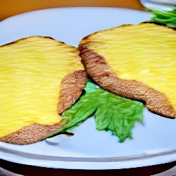 the melted cheese and beef are transferred to a plate.