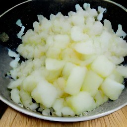 a peeled and chopped yellow onion.