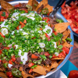 

Beyond Beef nachos is a delicious and healthy Mexican snack or appetizer made with meatless patties, yellow onions, tortilla chips, cashew nuts and is both eggs-free and lactose-free.