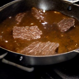 the asian sauce cooked beyond beef after being simmered in the skillet for 2 minutes.