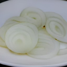 the onions are transferred to a second plate.