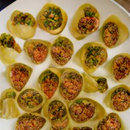 chopped parsley over beyond sausage stuffed pasta shells.