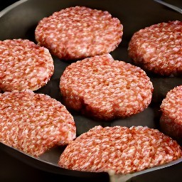 after coating a skillet with cooking spray and heating it, the cook placed the meatless burger patties in to be semi-cooked. after 3 minutes have passed, the burger patties are now semi-cooked.