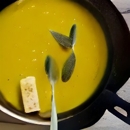 the buttery sage leaves are transferred to a serving plate.