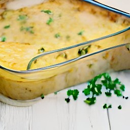 the final product should have three layers of potatoes, cheese sauce, and burger patties. the dish is then covered with foil and placed in a hot oven. after 75 minutes, the foil is removed and the dish is baked for an
