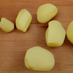 the potatoes peeled with a peeler.