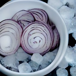 a bowl of ice water with sliced onion that has been set aside for 30 minutes to get crisped onions.