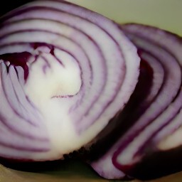a peeled and sliced red onion.