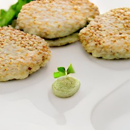 the burgers are now covered in a sesame seed crust.