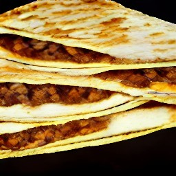 the food is transferred from the cooking surface to a plate.
