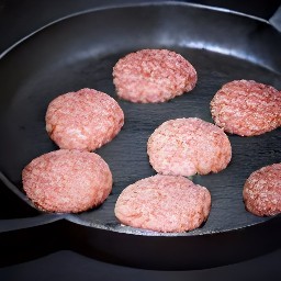 the meatless burger patties heated in a skillet over medium heat for 3 minutes.