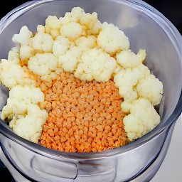 a chopped mixture of garlic, cauliflower, lentils, parsley, and basil.