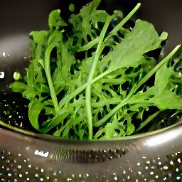 the arugula is drained.