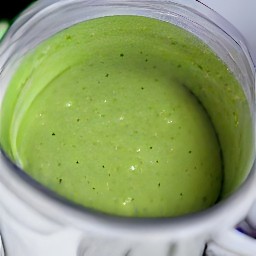 a dressing made from roasted garlic, cubed avocados, lemon juice, and yellow mustard.