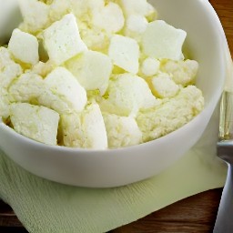 the feta cheese is crumbled into small pieces.