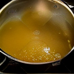 a pan of boiling vegetable broth.
