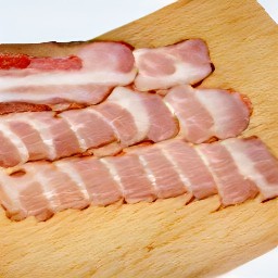 small pieces of broccoli and large pieces of vegetarian bacon.