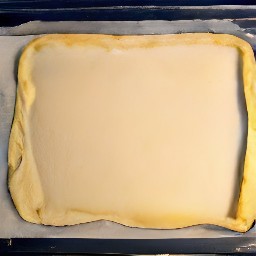 a puff pastry with a mushroom and squash mixture in the middle, leaving 3 inches border along the top and half an inch on both sides), with a third of beaten eggs in puff pastry (borders & sides