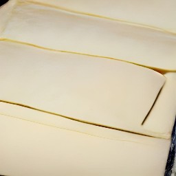a third of the beaten eggs are in folded puff pastry and are brushed with a brusher.