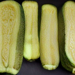 the zucchinis are cut thinly lengthwise.